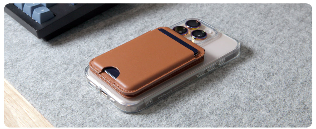 Saddle Tan Enclave wallet attached to the back of an iPhone